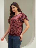 The Radiant Velvet Flutter Top in Wine