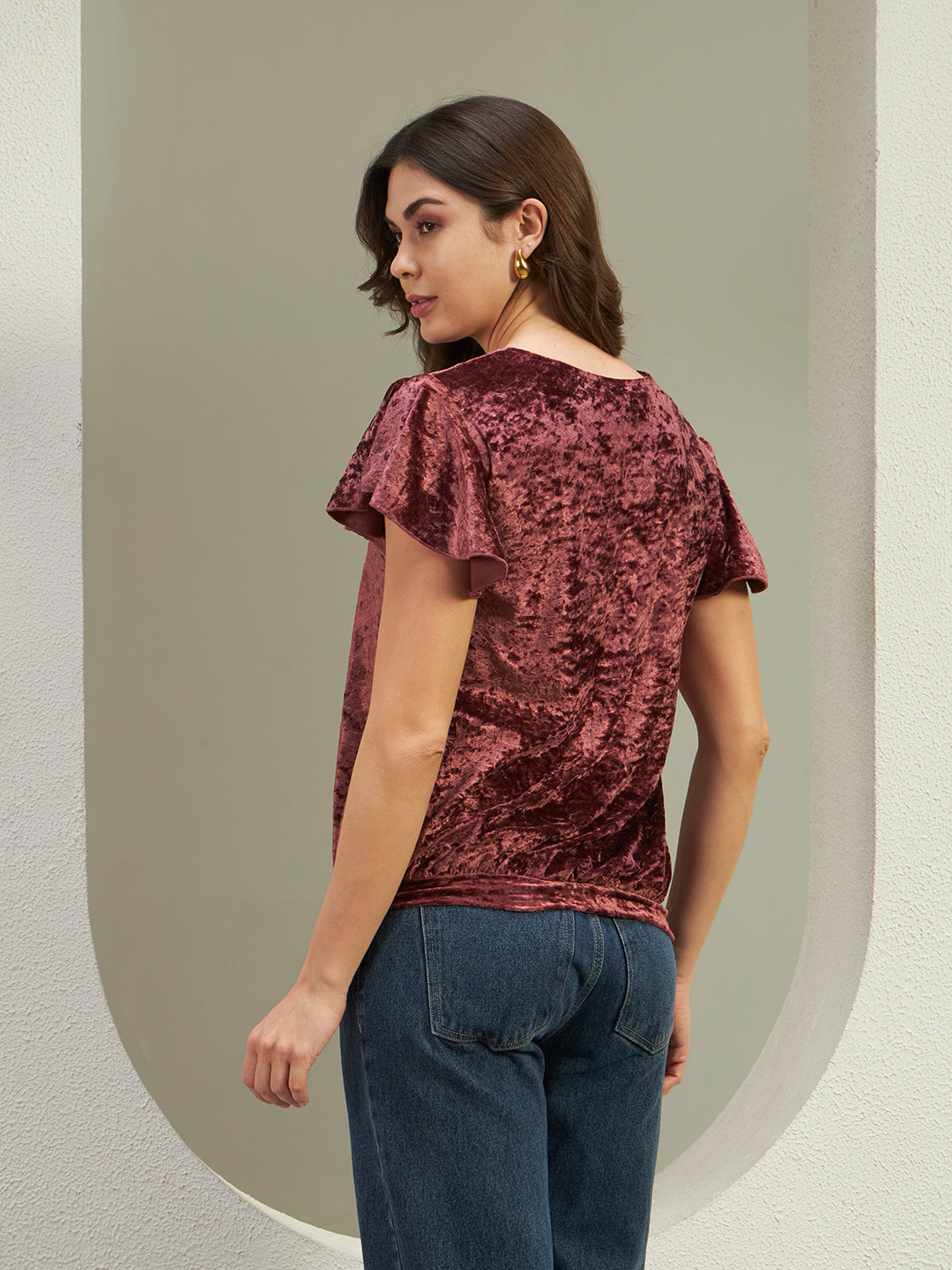 The Radiant Velvet Flutter Top in Wine